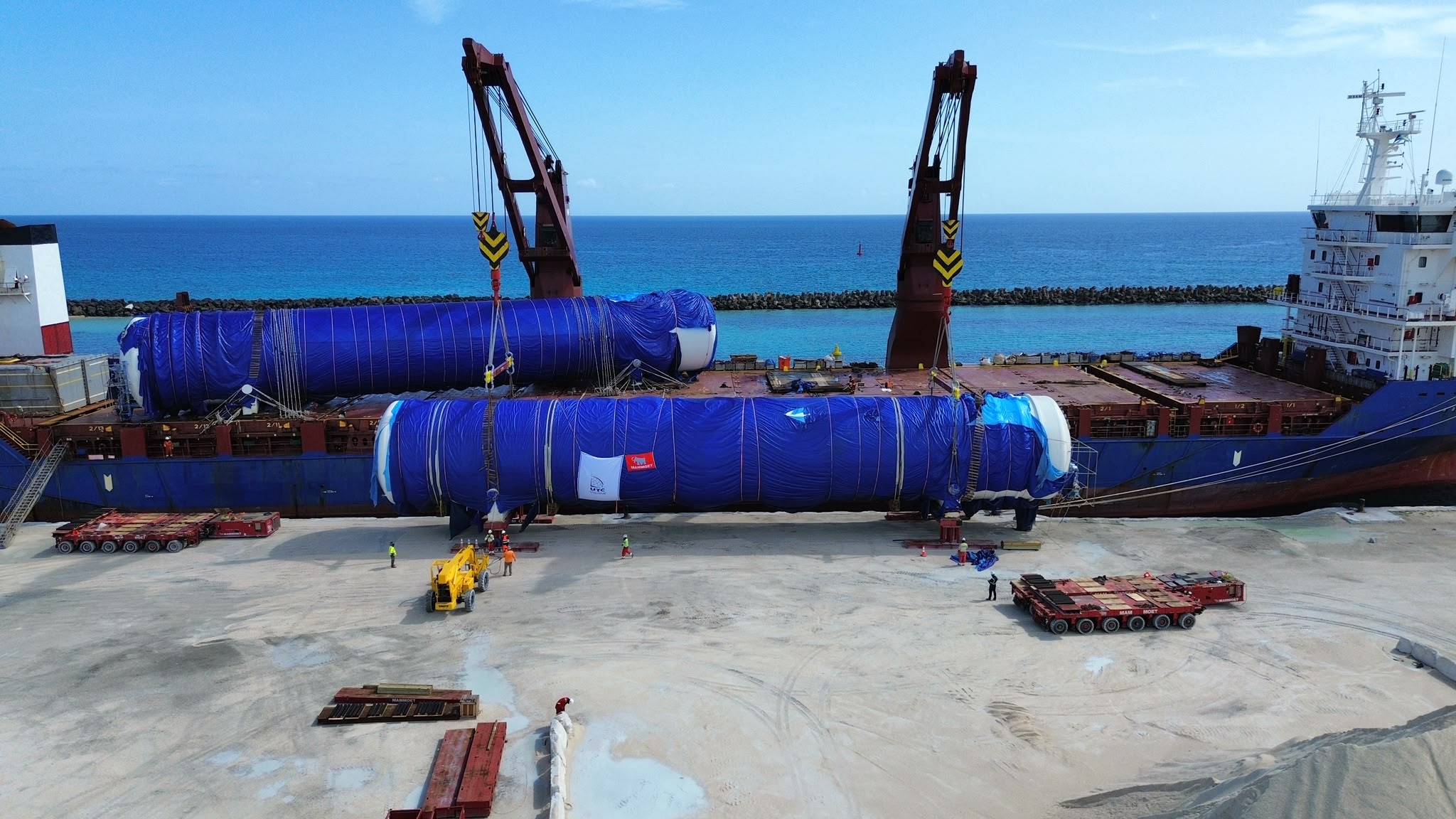 LNG tanks being offloaded at Arawak Cay